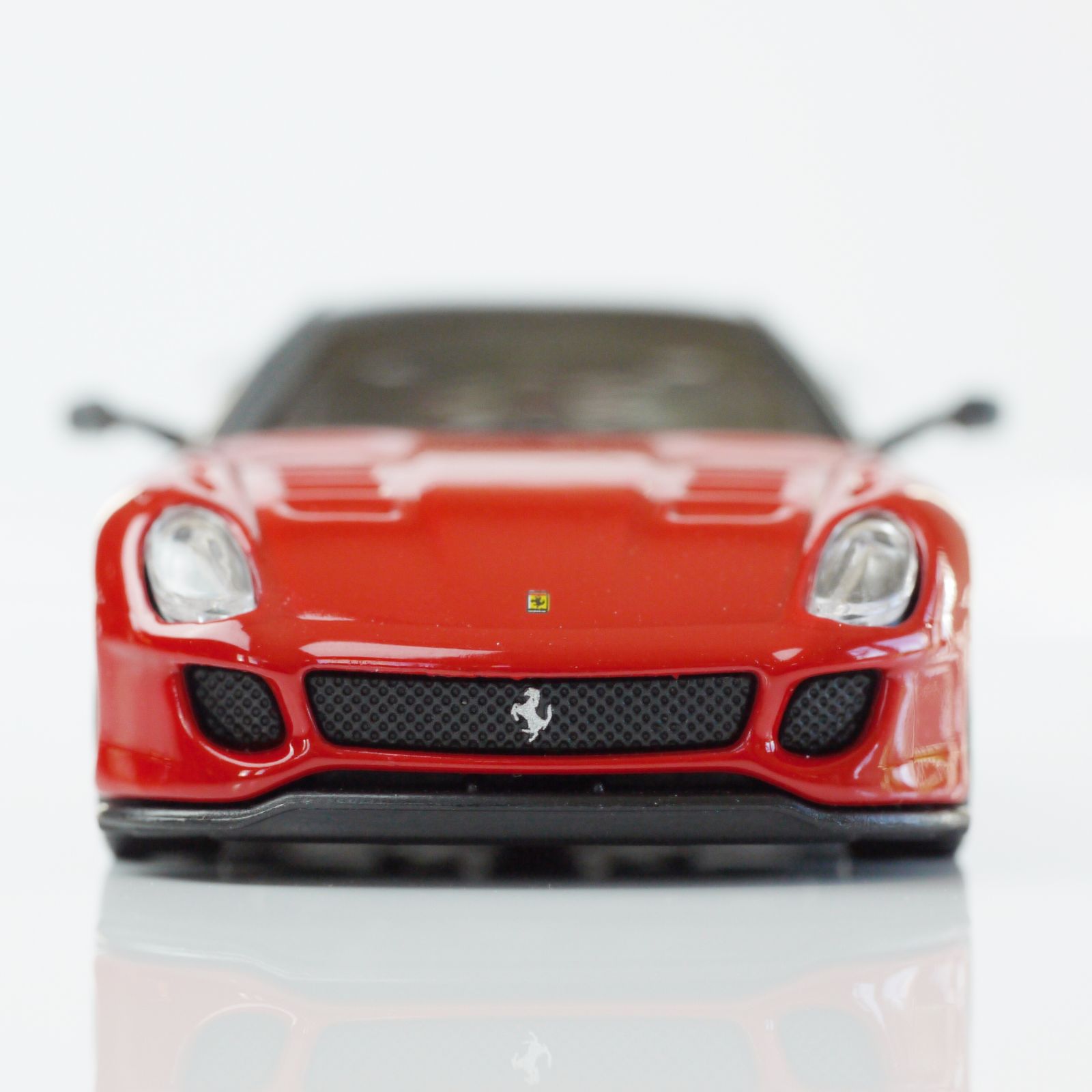 Illustration for article titled Kyosho Ferrari 8 1/64 #64 - Project Prancing Horse #64 - 2010 Ferrari 599XX