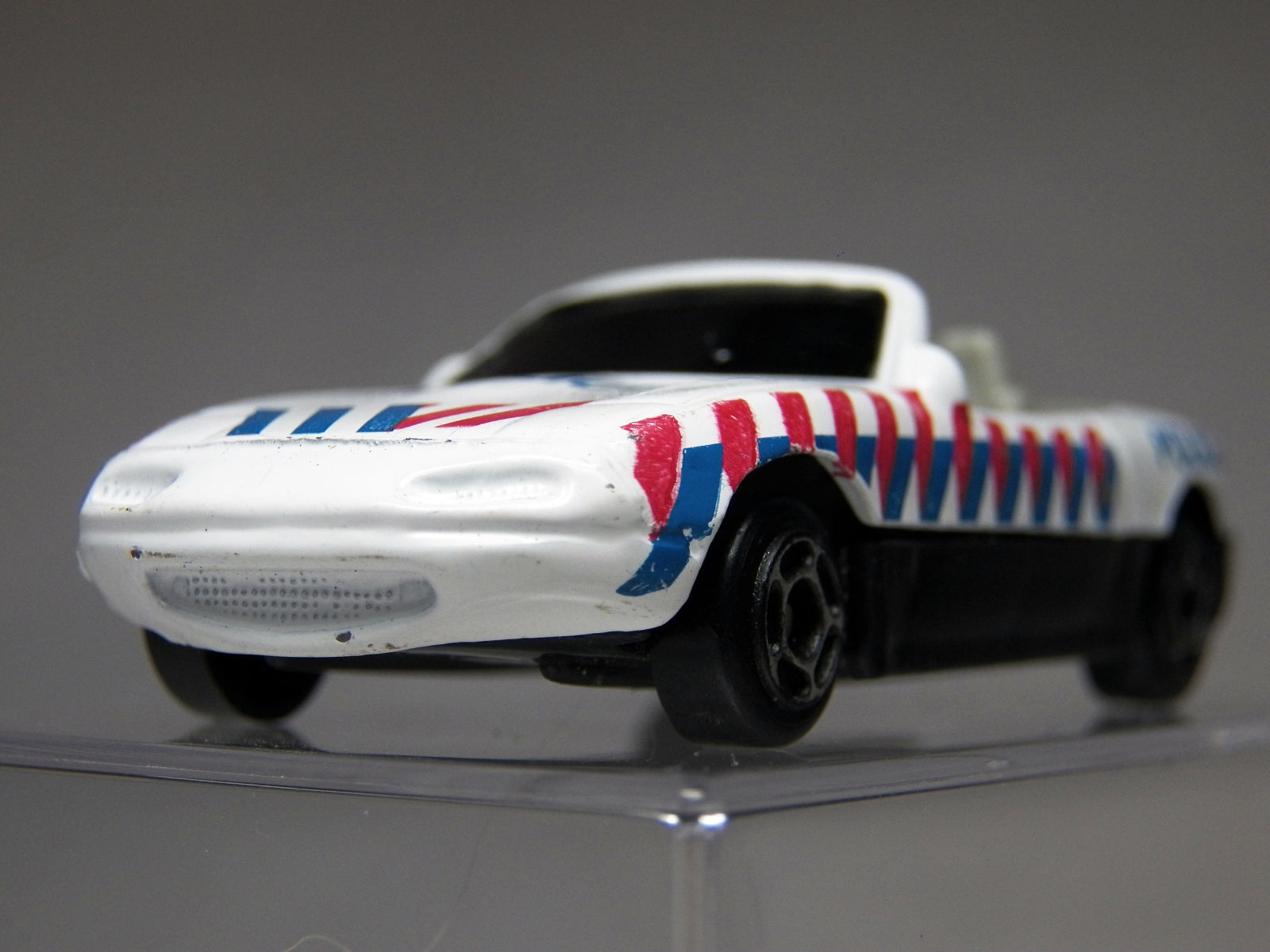 Illustration for article titled Hide the Vo5! Its the hairdresser police! 1:64 Rozzer Miata.