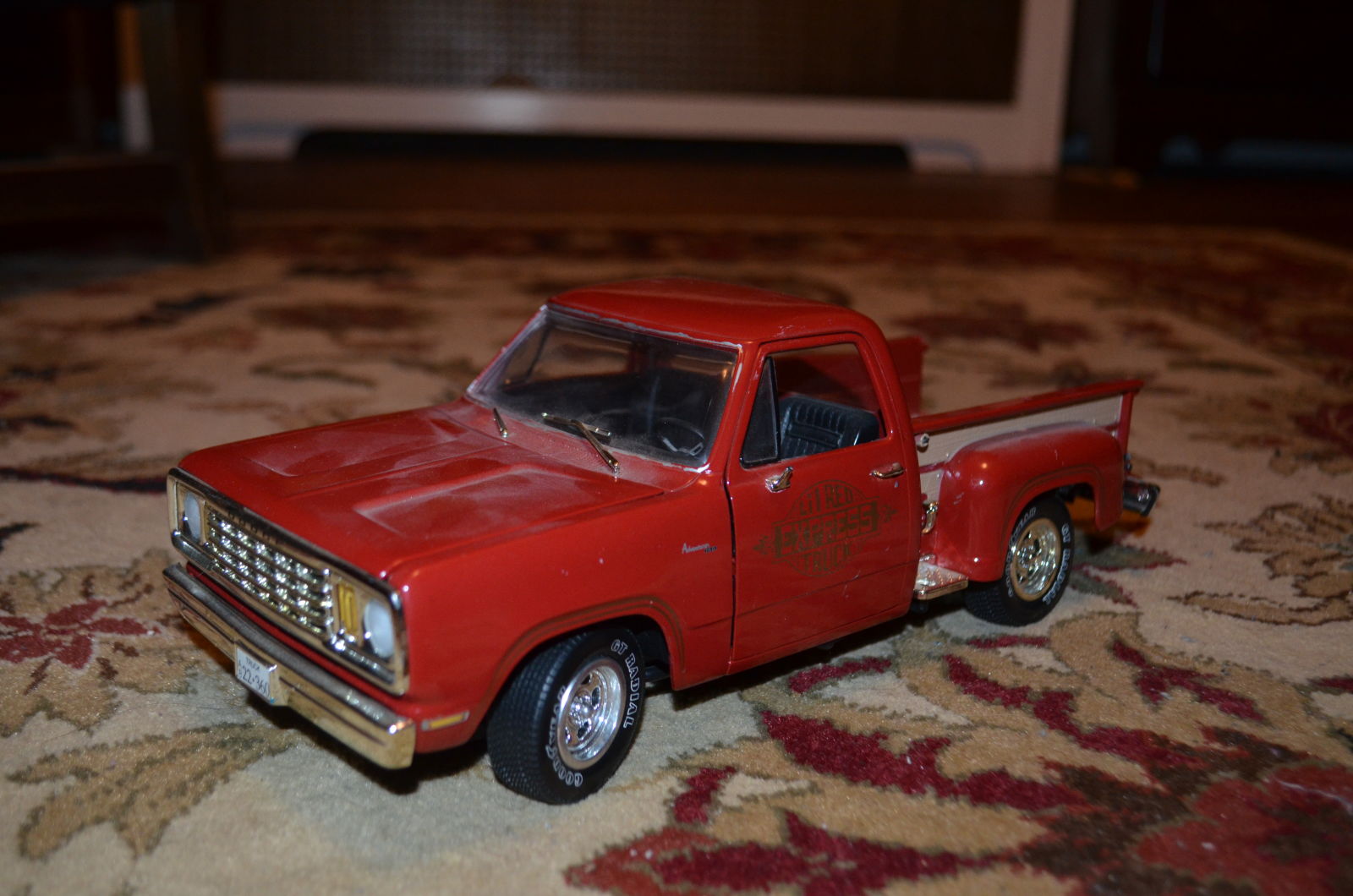  1/18 Dodge “Little Red Wagon” pickup. Missing stacks, side mirrors and one wiper. Probably parts or custom fodder at best.  