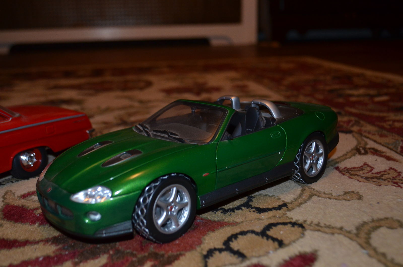  1/18 Jaguar from “Die Another Day”. mirrors broken off (one present), gatling gun cover is missing in pic, but I have it.  