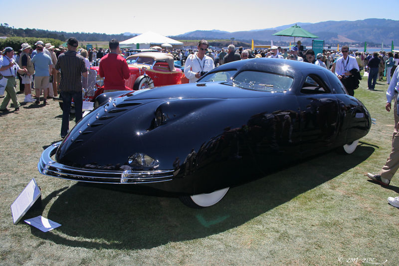 Real car for reference: https://upload.wikimedia.org/wikipedia/commons/2/25/1938_Phantom_Corsair_Pebble_Beach_Concours_dElegance _2007_01.jpg