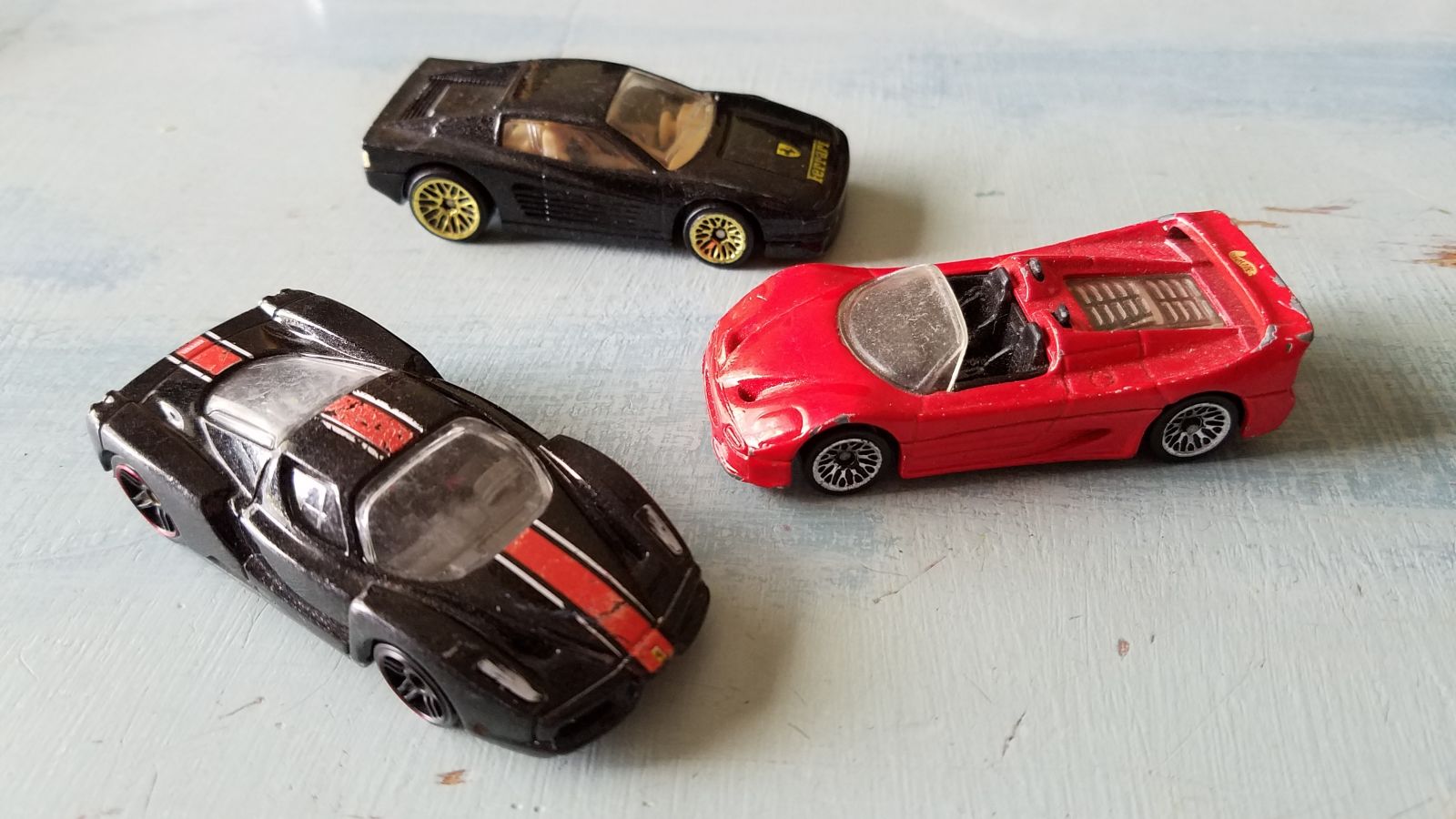 The Ferraris. All playworn to various degrees. The Testarossa is in the best condition of the three. Then the F50. And the Enzo last. I’m going to leave the Testarossa as is, but the F50 and Enzo will be going to the workbench to be refreshed. 