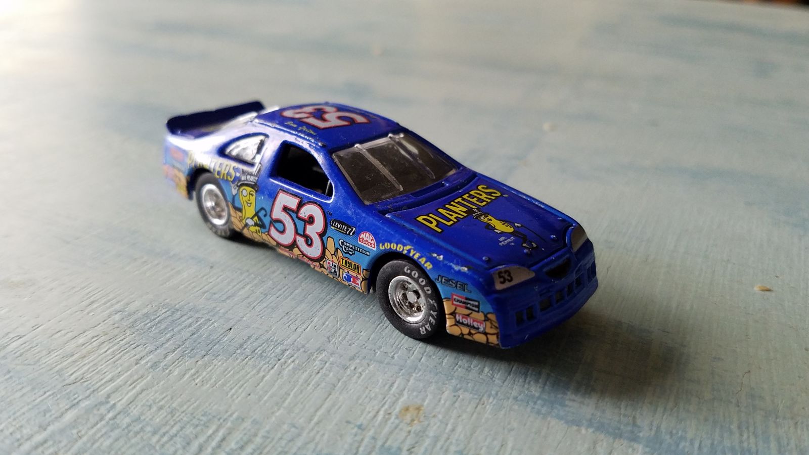 A Johnny Lightning stock car. I bought this one just for the wheels. Couldn’t pass up rubber Goodyears for 50 cents. 