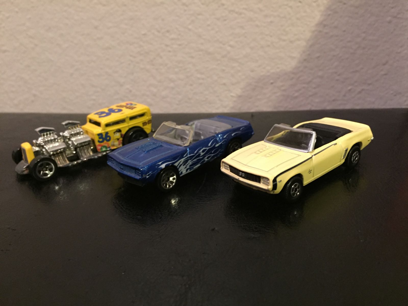These were some of the cars I found in my old room. The camaros are matchbox, the one on the right has some awesome detail and will be In line for a wheel swap In the future. The hot rod in the end will be a future custom as well. 
