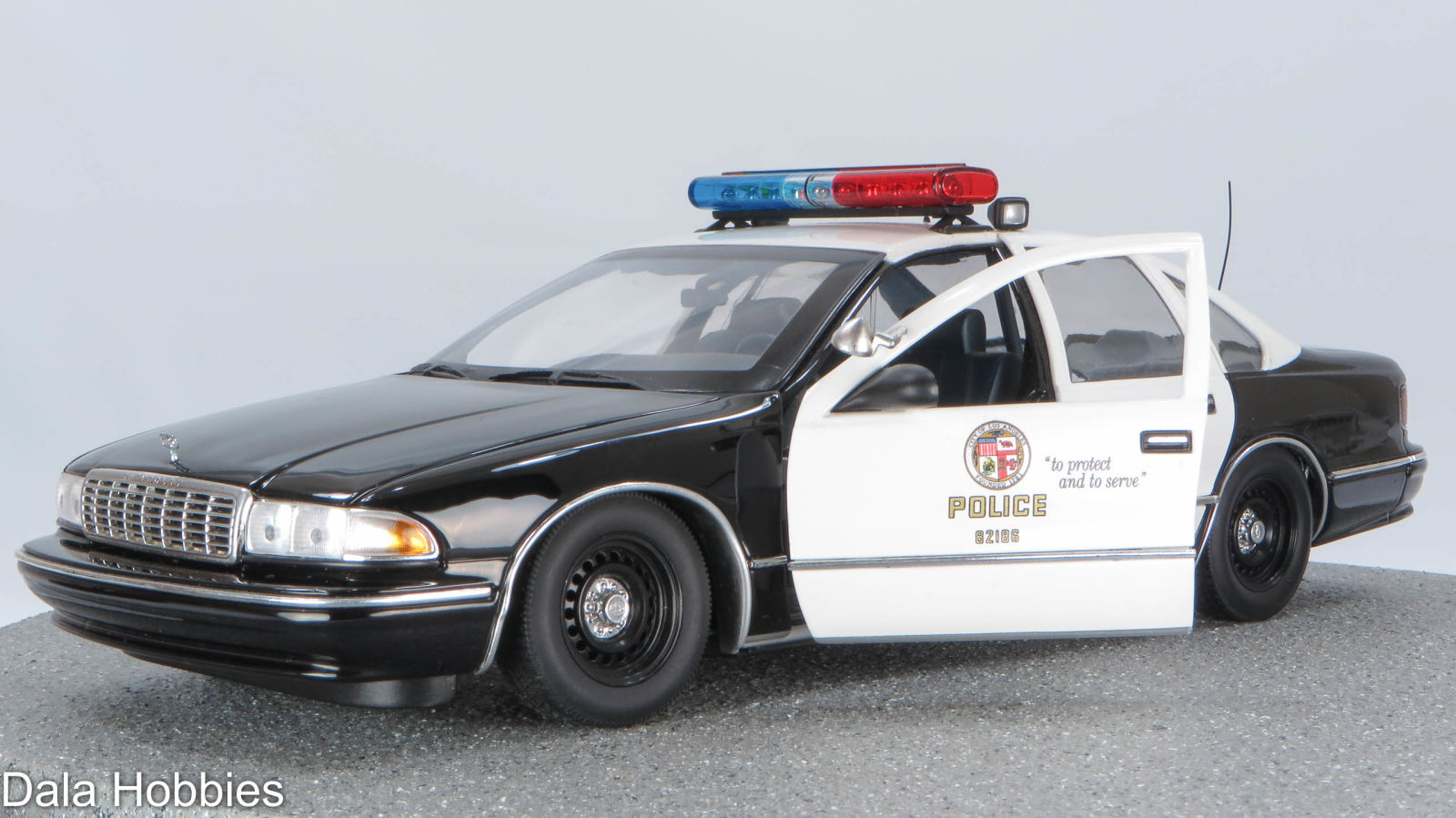 Illustration for article titled Oh no its the 5 O..UT Models LAPD Police Car 1:18 Scale