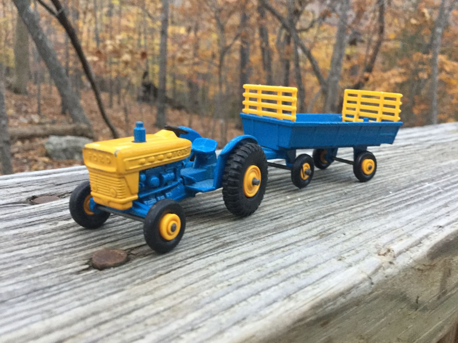 Ford Tractor and trailer. The yellow pieces in the trailer are often missing.