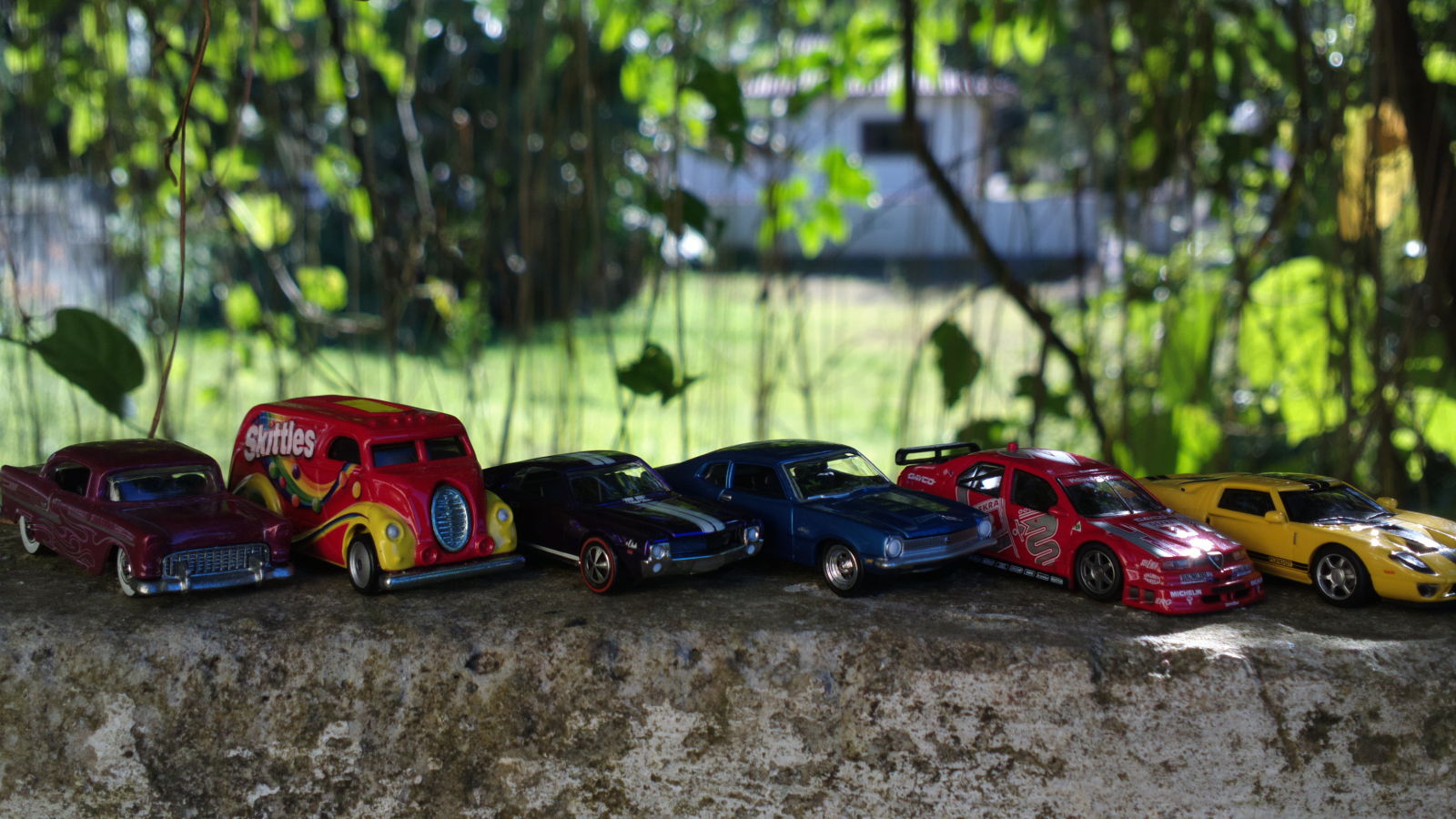 From left to right, a Super Treasure Hunt, a Popular Culture, a RLC-Exclusive, a Johnny Lightning, a Kyosho and an AutoArt