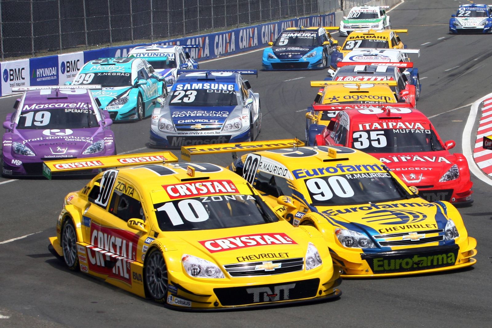 Several Chevrolet Vectras and Peugeot 407s. Battling for first, Ricardo Zonta and R. Maurício.