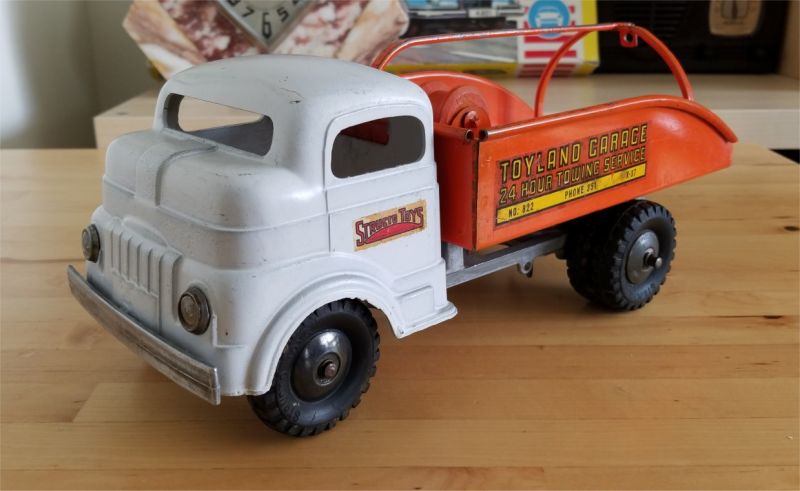 Illustration for article titled Garage Sale Surprise - Structo Toyland Garage Tow Truck (and bonus)