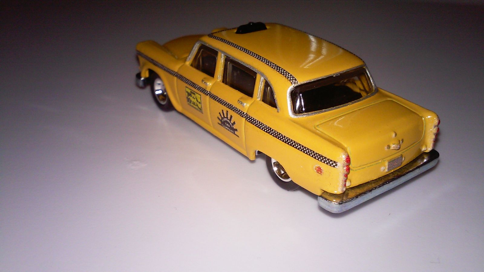 Illustration for article titled Hot Wheels 74 Checker Taxi Cab
