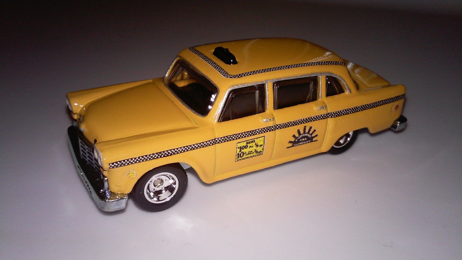 Illustration for article titled Hot Wheels 74 Checker Taxi Cab