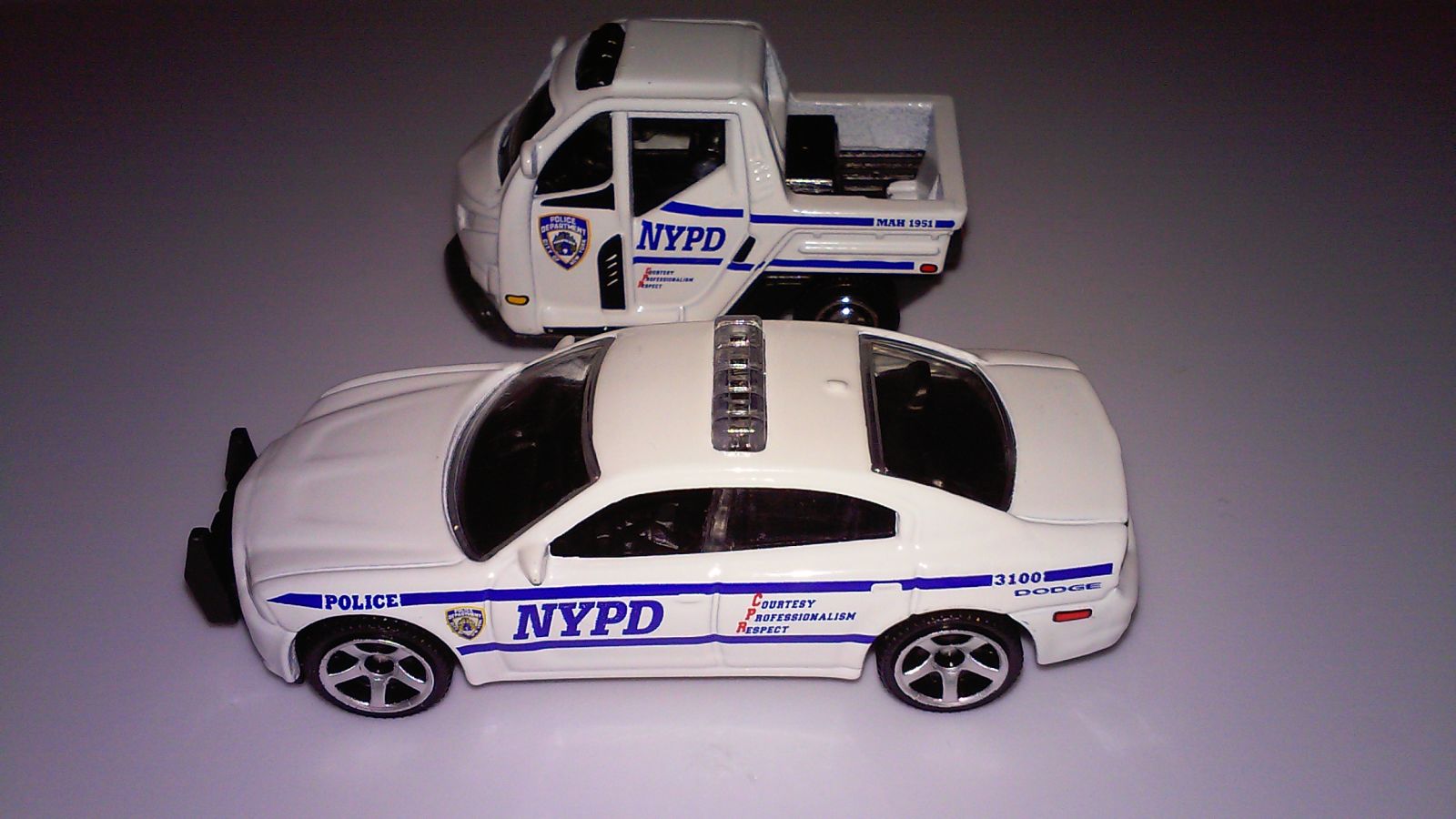 Illustration for article titled Matchbox NYPD Dodge Charger and NYPD Meter Maid.