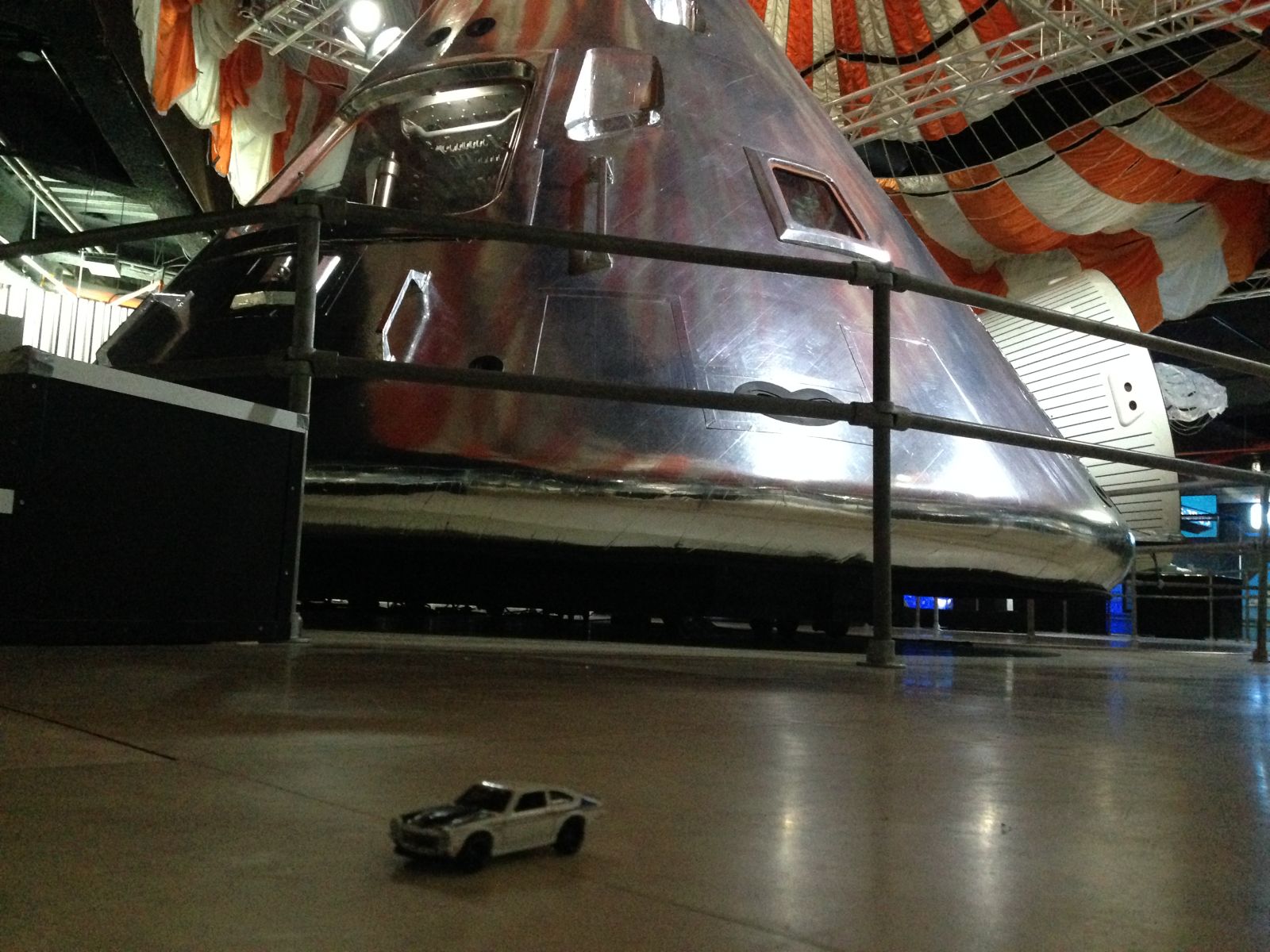 Replica of the Apollo Command Module with the parachute mounted on the ceiling