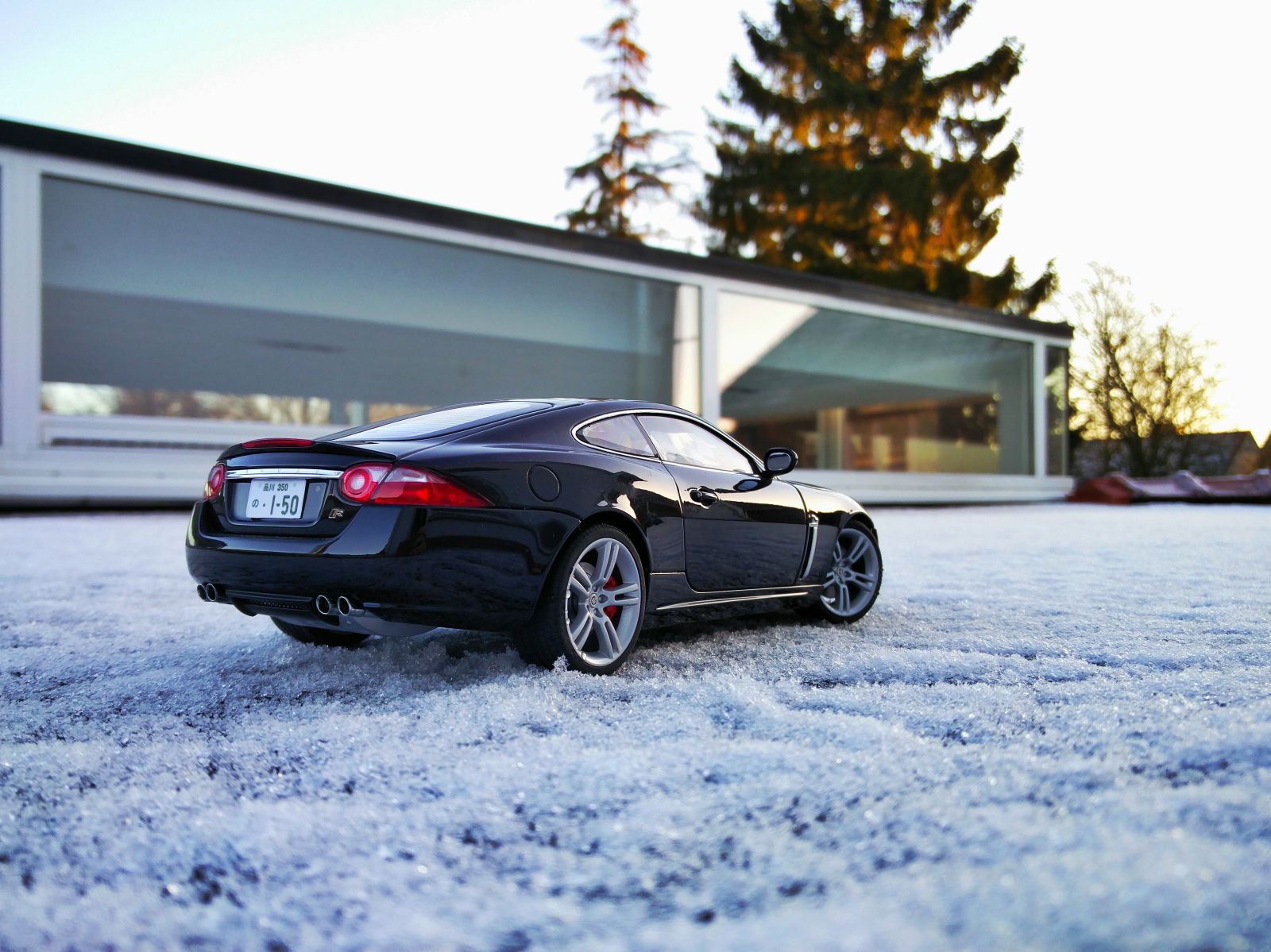Illustration for article titled Cool as frost: The Jaguar XKR - 1:18 Autoart
