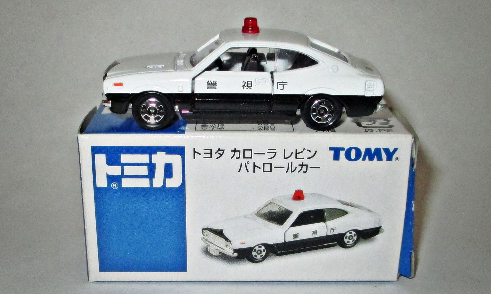 Illustration for article titled Hour Rule: Tomica Toyota Corolla Levin Patrol Car