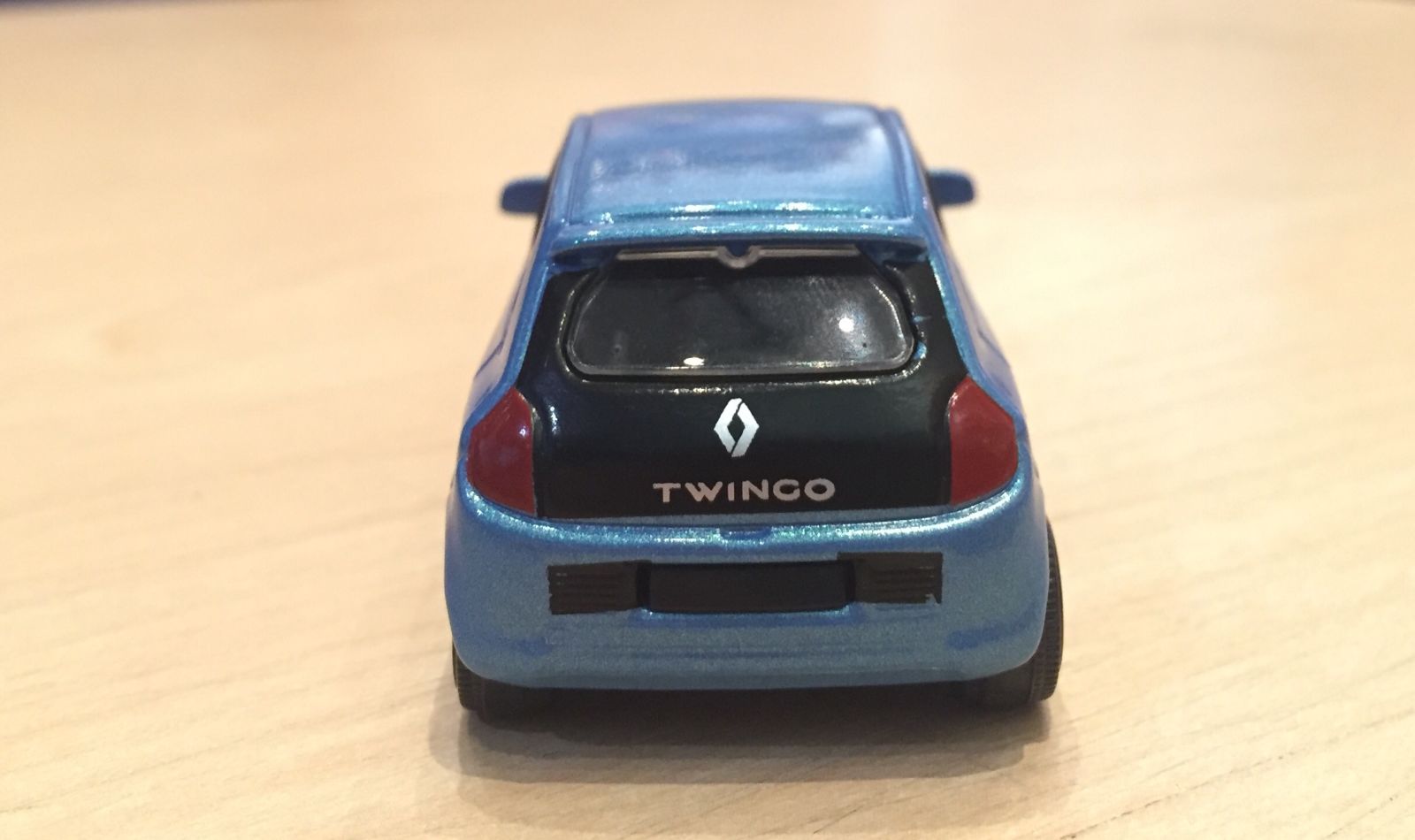 Painted taillights, Renault diamond badge and Twingo wording badge tampos are a nice touch on a small toy.