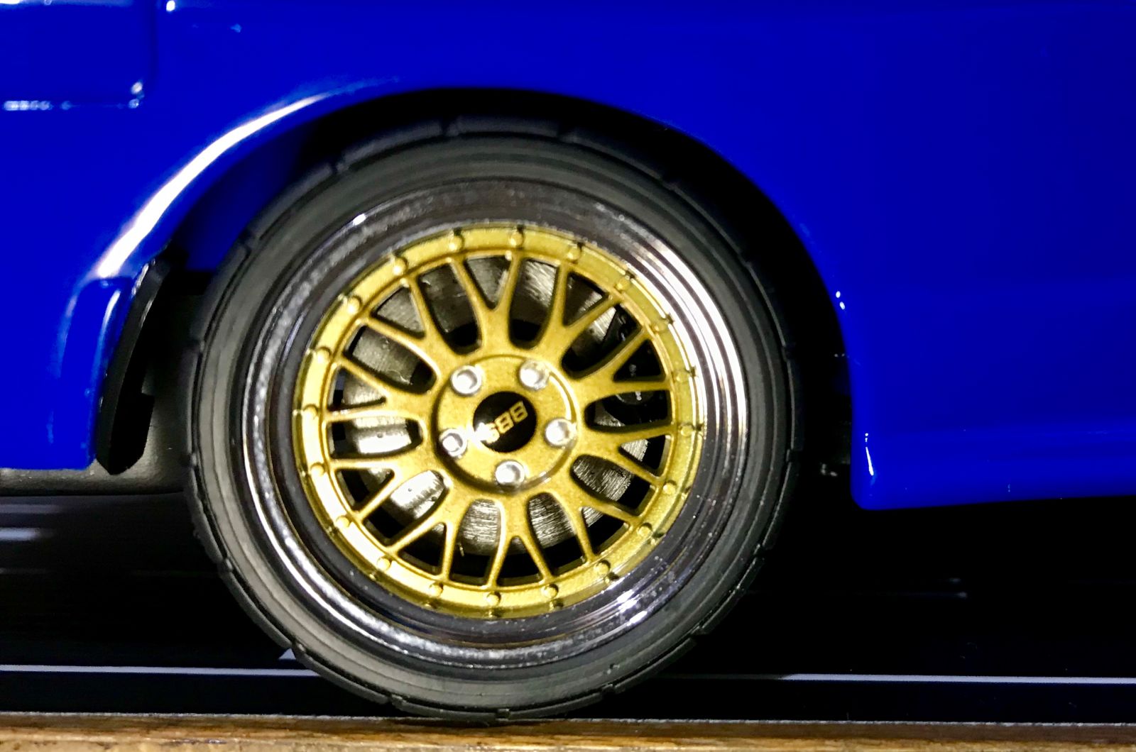 BBS Mesh wheels and gold finish is a winning combo in my book. The rear brake disks spin with the wheels, while the single-piston Brembo calipers stay in place. A cool touch!
