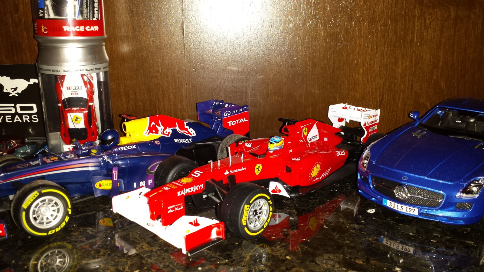 Illustration for article titled My lil brothers 1:18 F1 R/c cars ( i need ones for me)