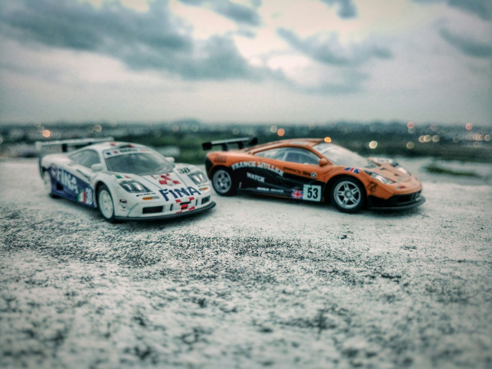 (L) the Team Bigazzi FINA #38 and (R) The Franck Muller Watch #53, both 1/43 models of the 1996 McLaren F1-GTR
