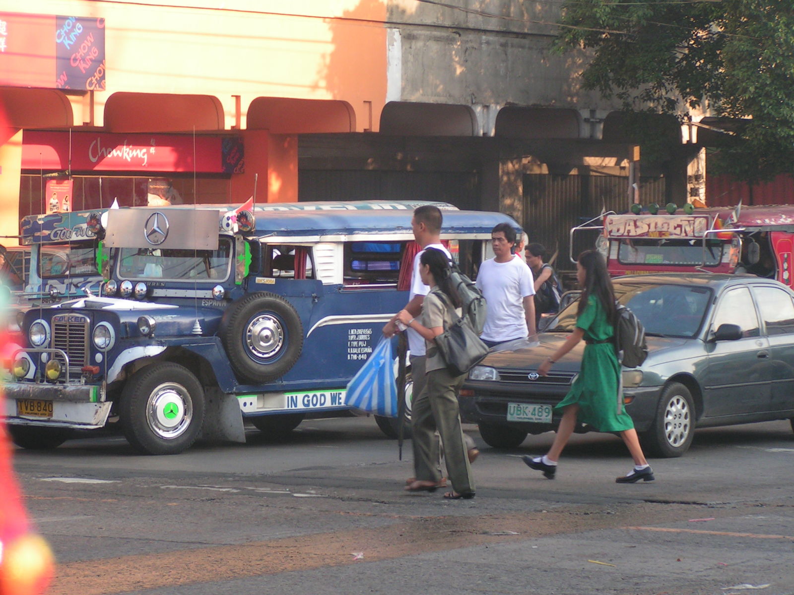 A jeepney with Mercedes hubcaps and a logo above the windshield. I wonder if it comes with a Mercedes engine as well. An AMG perhaps?