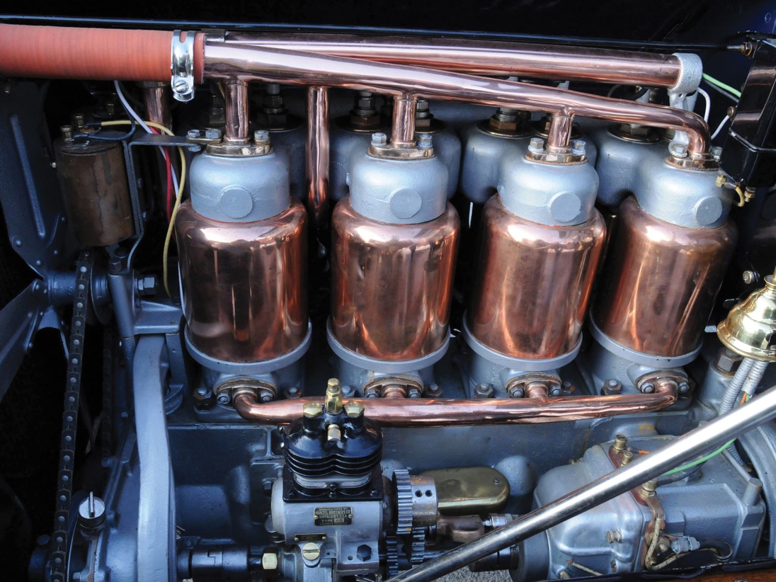 Illustration for article titled No Engine is Prettier Than a Copper Jacket Cadillac.