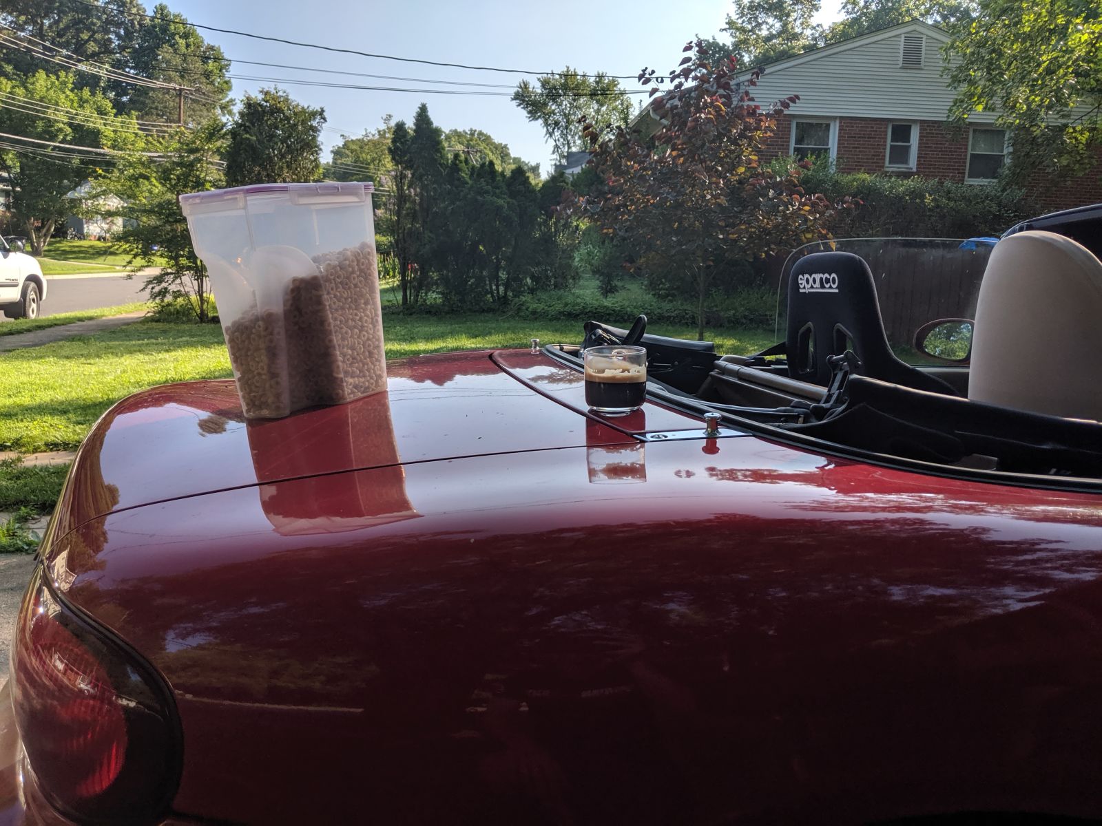 Illustration for article titled Flood status update: espresso and Cheerios on a Miata