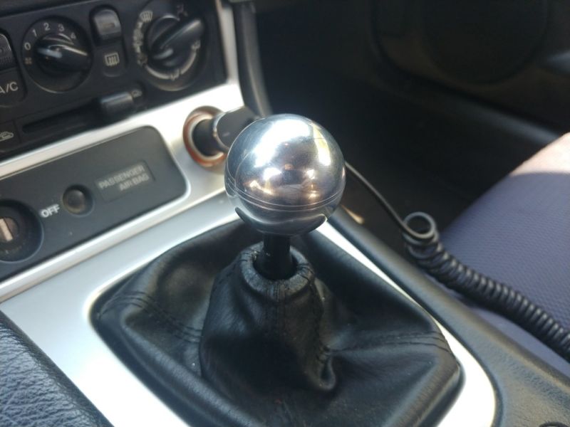I tested the ball knob on the shifter and found that the hole and the threading were too big. You can also see the deep gouge the vice had made on the ball.