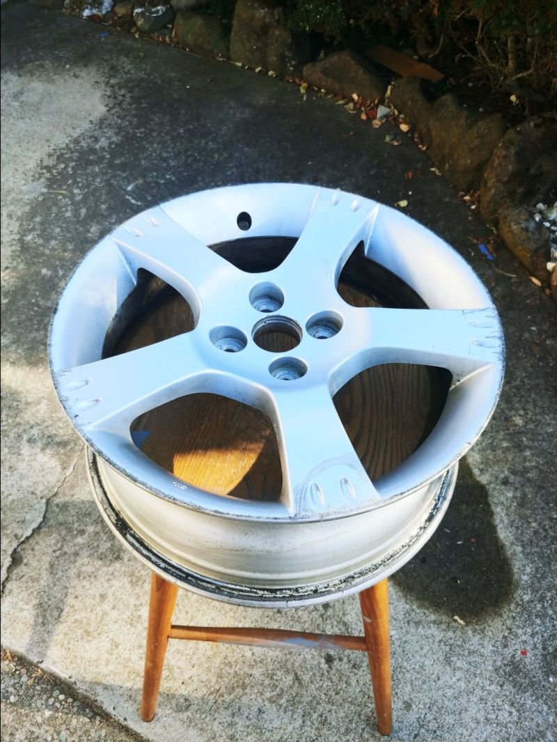 One of the wheels just before sanding. Notice the gouging around the edge of the rim. This wheel was probably the most curbed of the set!
