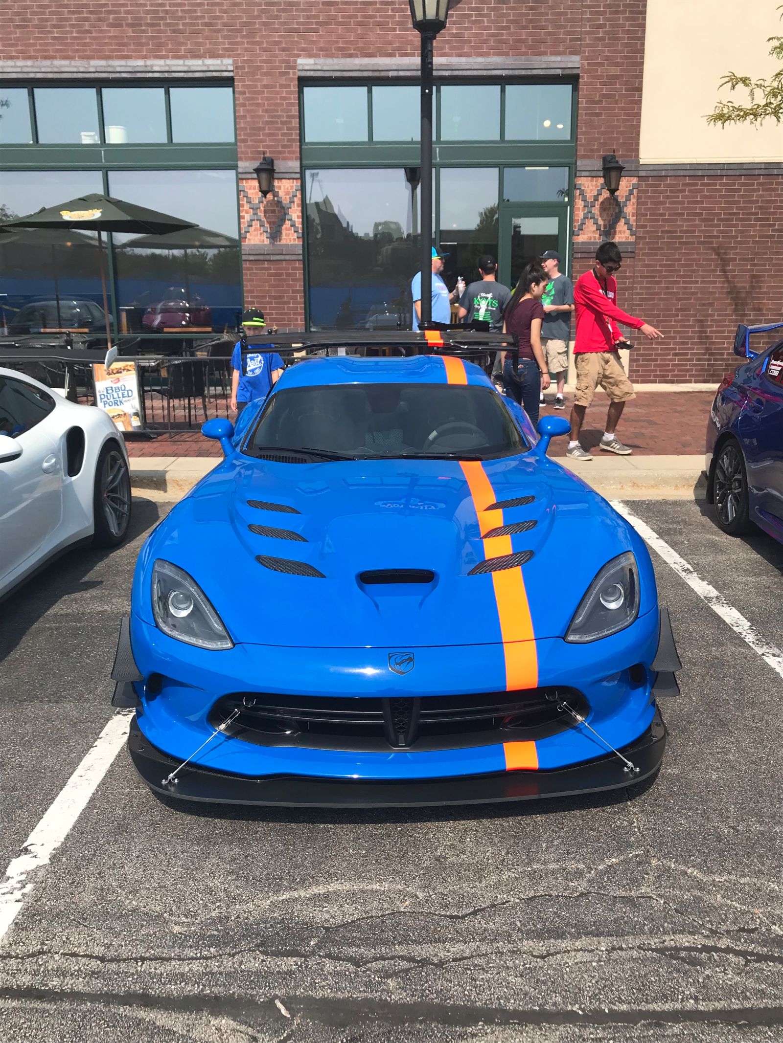Striking color combo and that guy in back is really impressed with that taillight 
