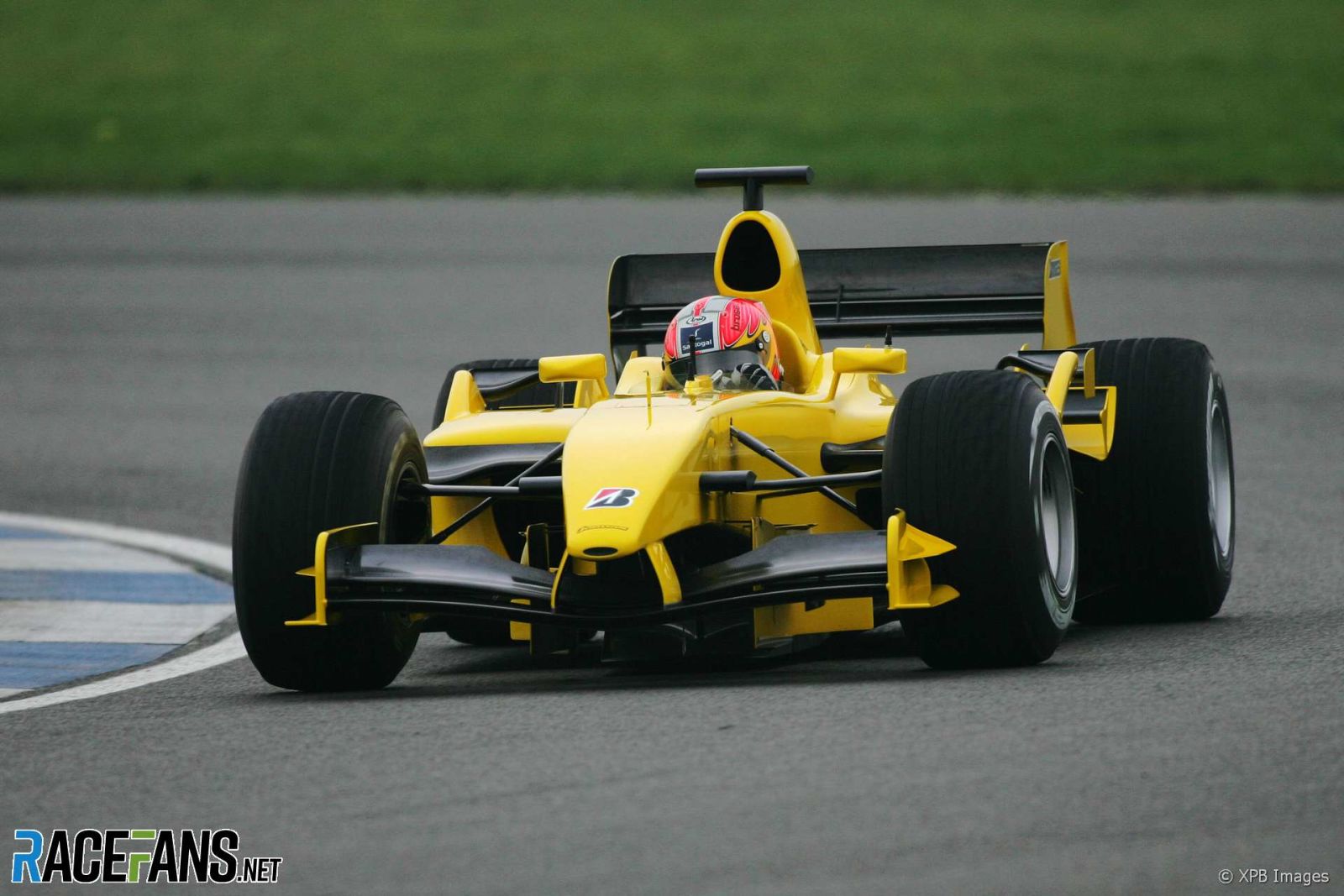 Illustration for article titled Podium-winning 2005 Jordan EJ15 F1 car, in plain pre-season testing livery