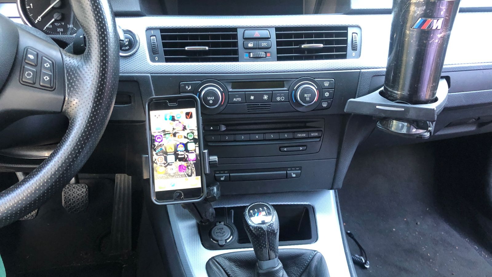 Illustration for article titled Final iteration of the E9X phone holder has been installed into my car