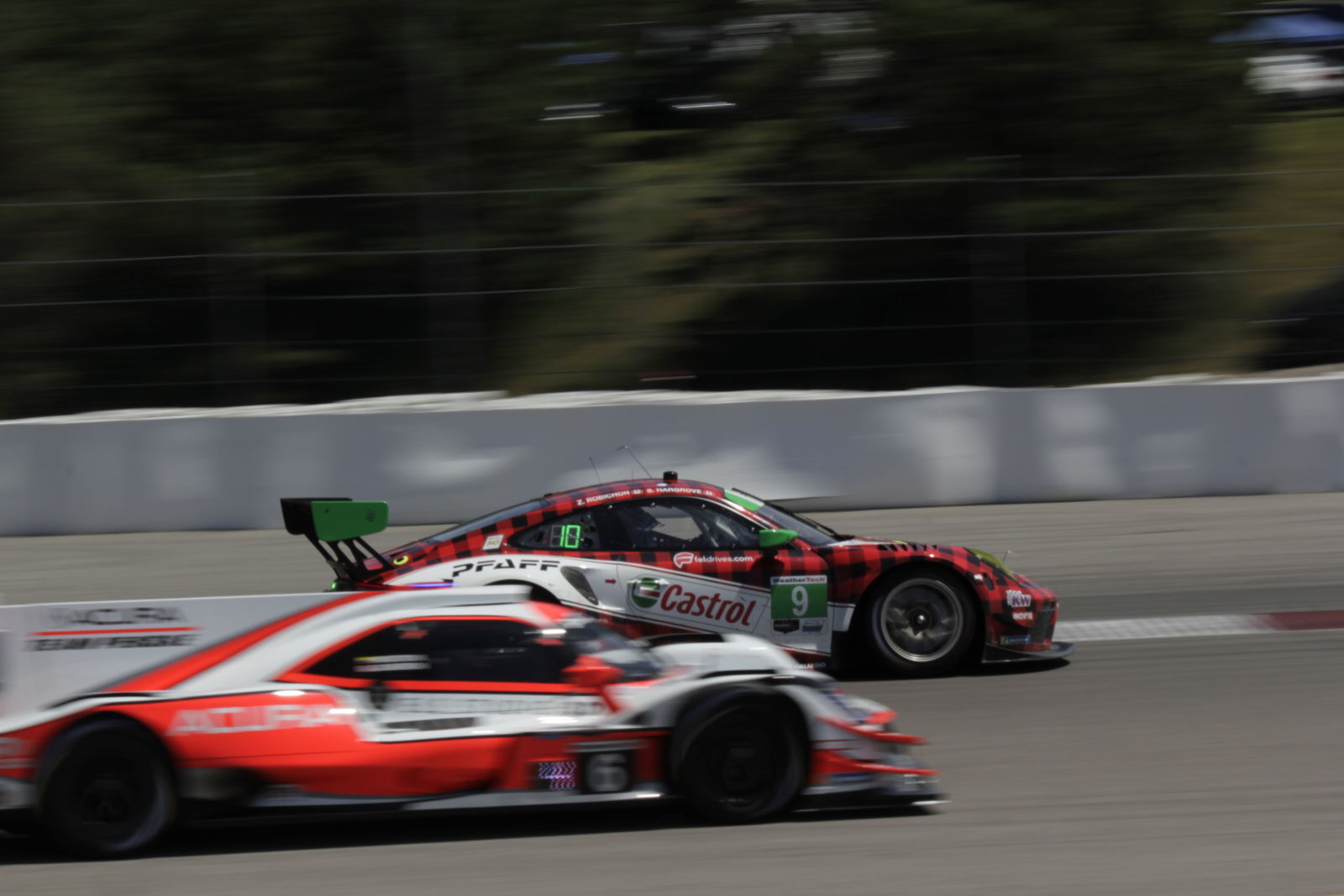 This was going to just be a shot of the Pfaff porche, then Mr. Acura DPi came into it. Made it a neat shot.