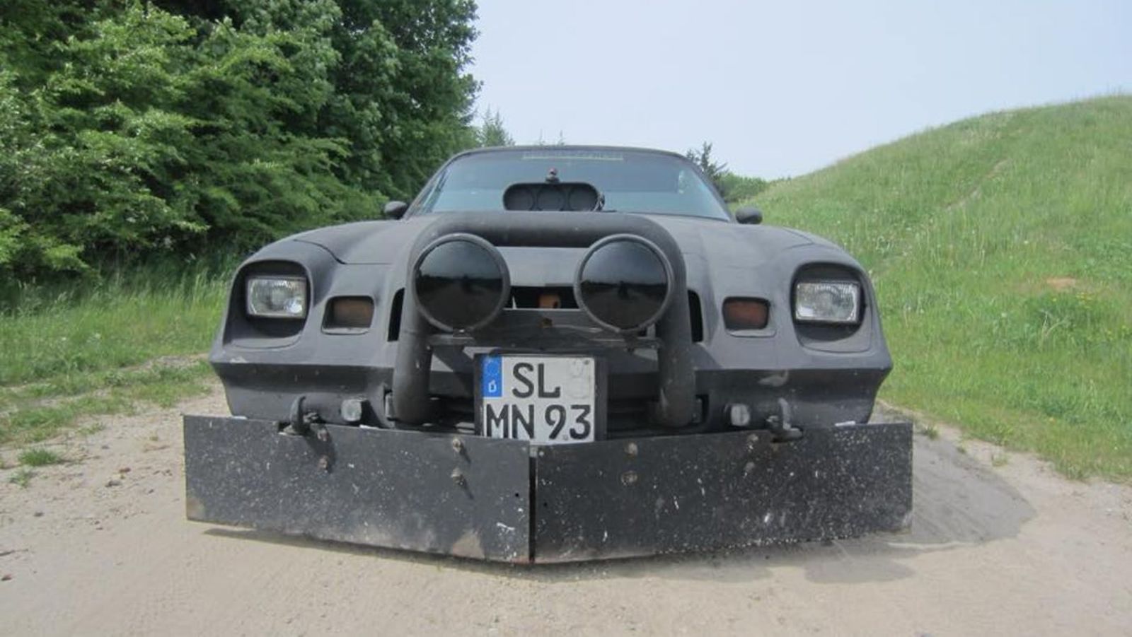 Illustration for article titled Ghost car: A Camaro used in the Bosnian war in the 90s.