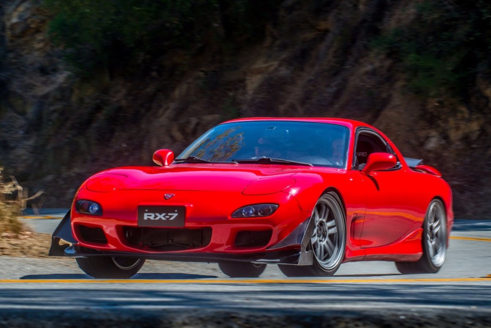 FD Rx7 for the purpose of canyon carving/fun street driving and bringing to car meets, preferably in red