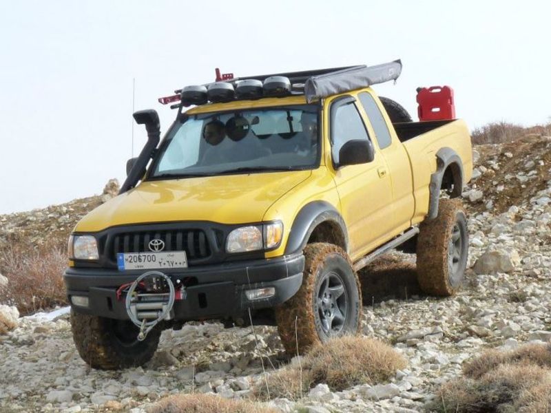 Unsure what vintage but a 4WD Taco for the purpose of being a tow vehicle for my race car, an offroad/camping vehicle, and something to take skiing as well. I would probably want a newer one in crew cab guise and have some sort of modified bed cabin thing, could care less what color as I will be abusing it lol. 
