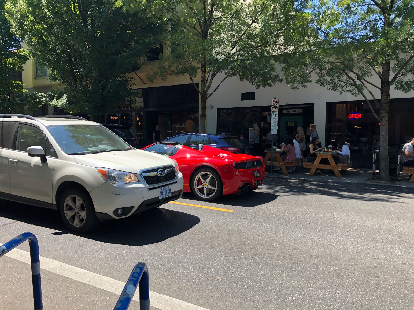 458 Spider, and yes, the driver is wearing a matching Ferrari hat.