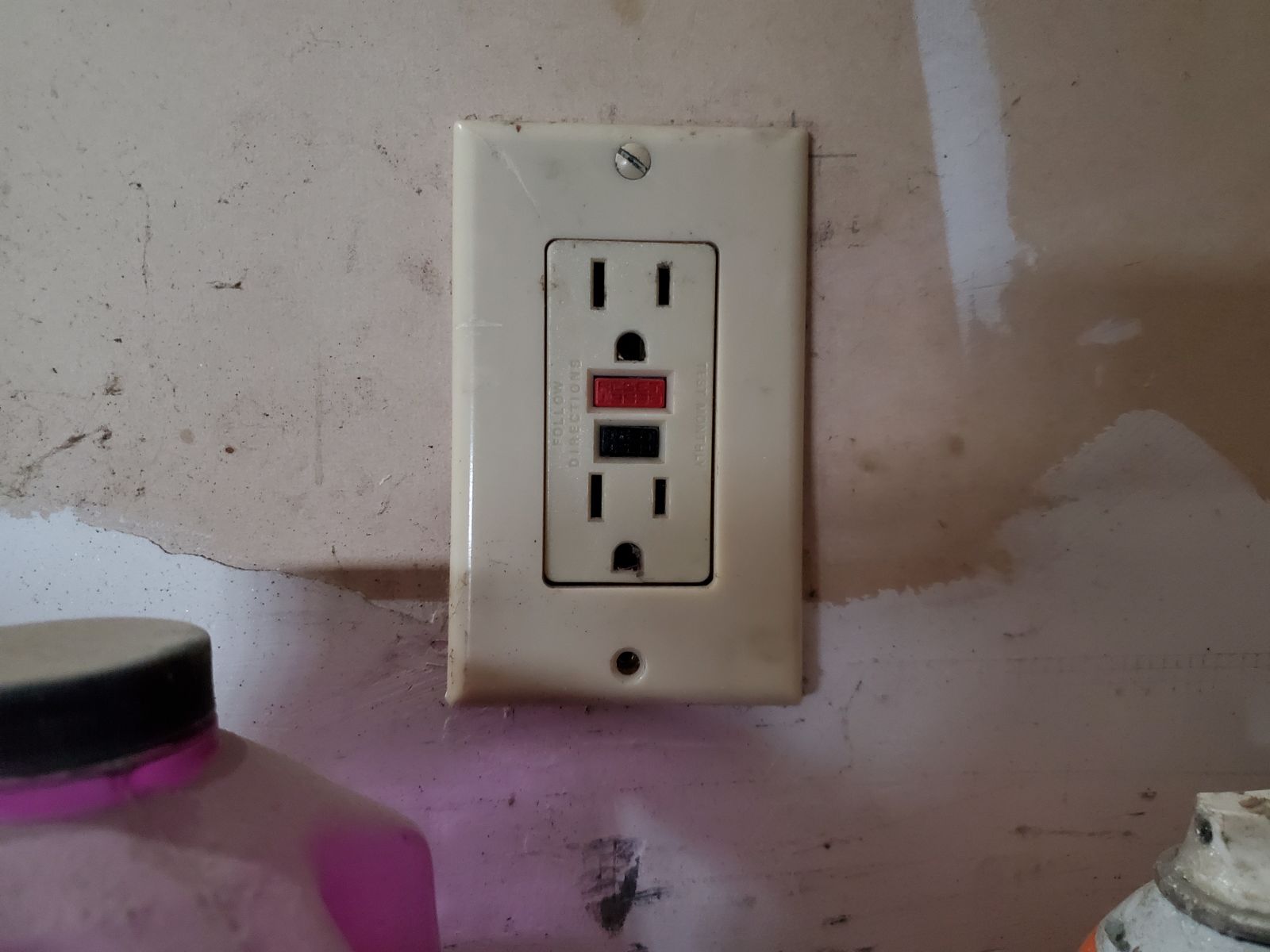 This socket and fuse reset button seems to supply the garage, in the past when the circuit blows its reset here rather then the breaker panel 