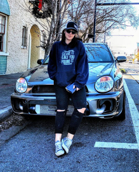 The Proud Owner and the most ironic hoodie ever with her car in mind.