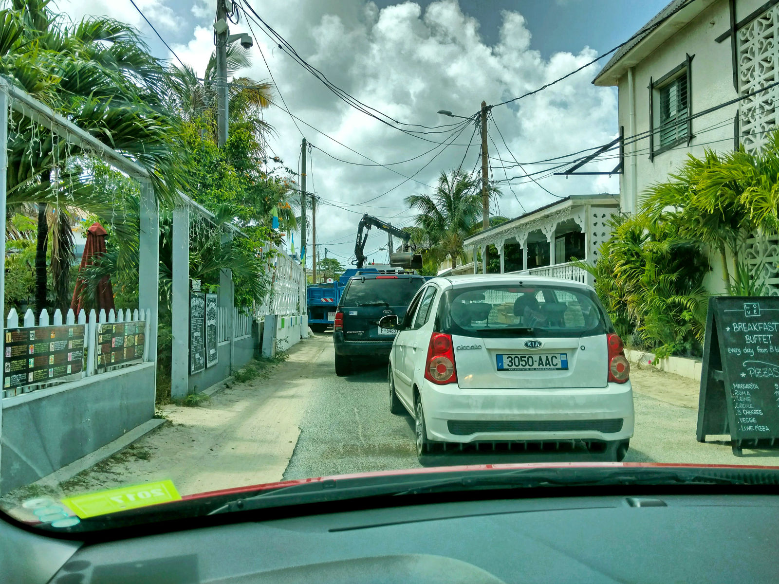Typical St. Martin traffic jam: a construction vehicle stops in the middle of the road for a while, and...I’m behind a Kia Picanto!