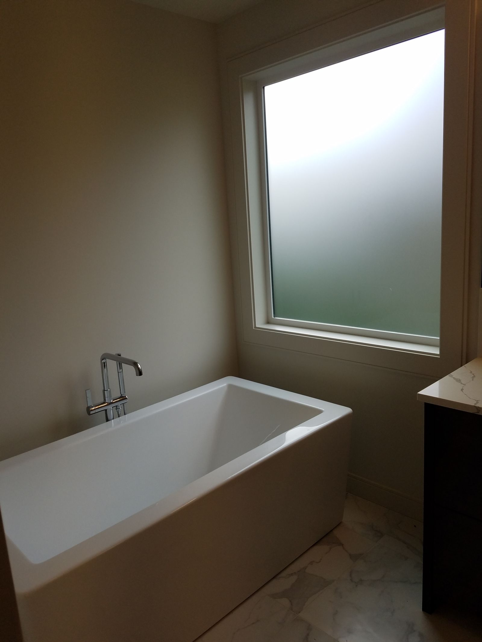 Yes folks, they actually sprang for frosted glass so you can walk around naked in your bathroom in peace.