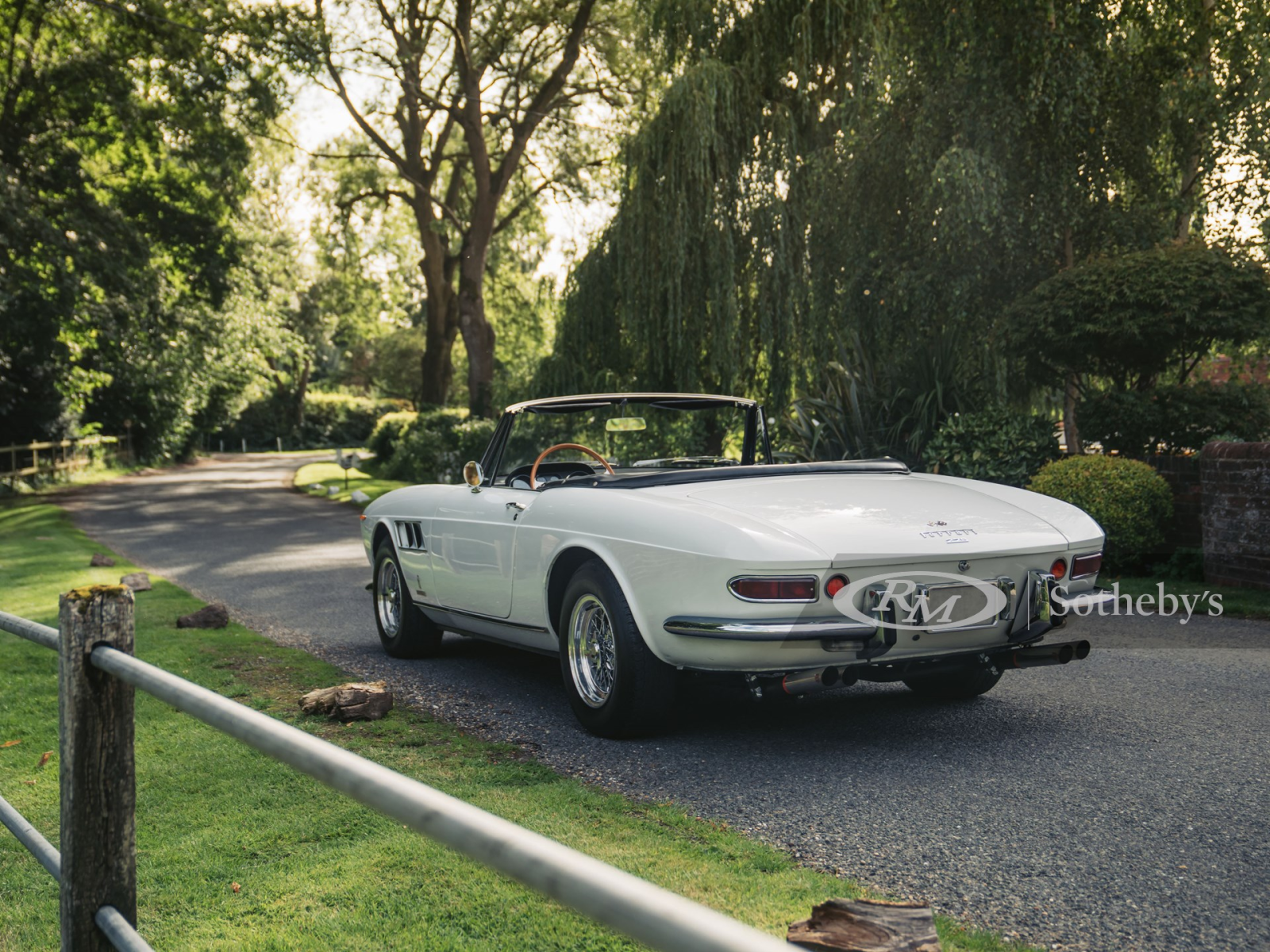 Illustration for article titled The 1966 Ferrari 275 GTS finished in Bianco over Blue...