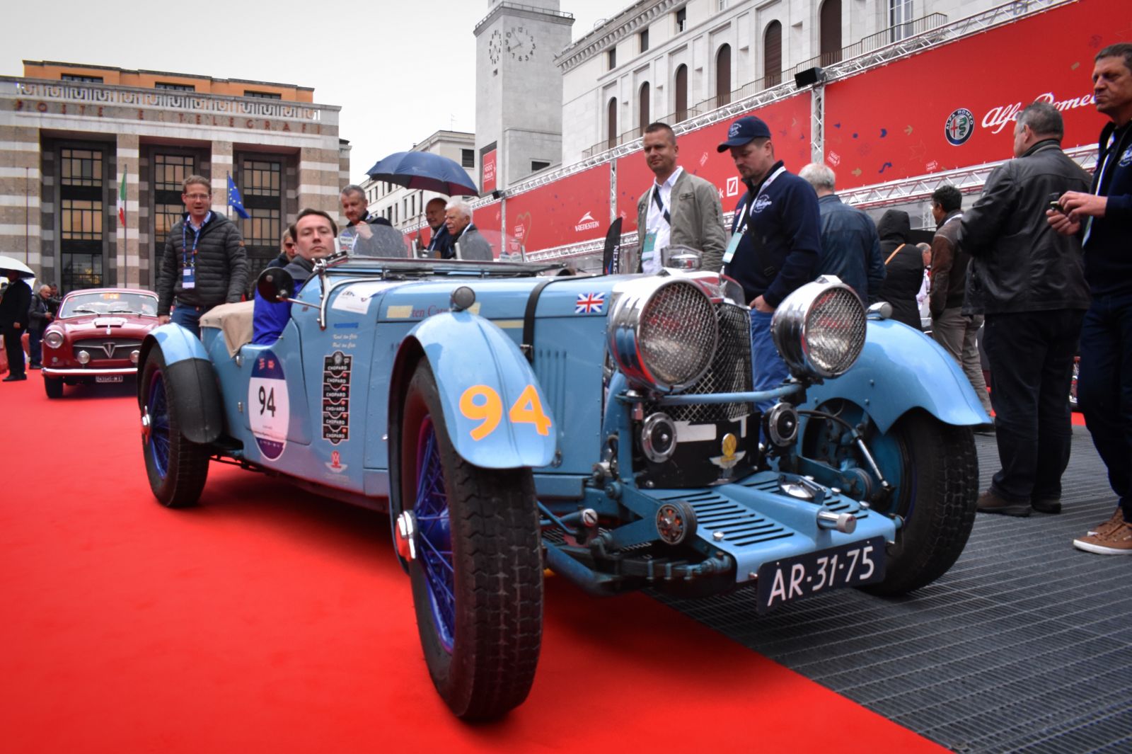The red carpet of the Mille Miglia “Village” is a madhouse parade in the hours leading up to the start of the race.