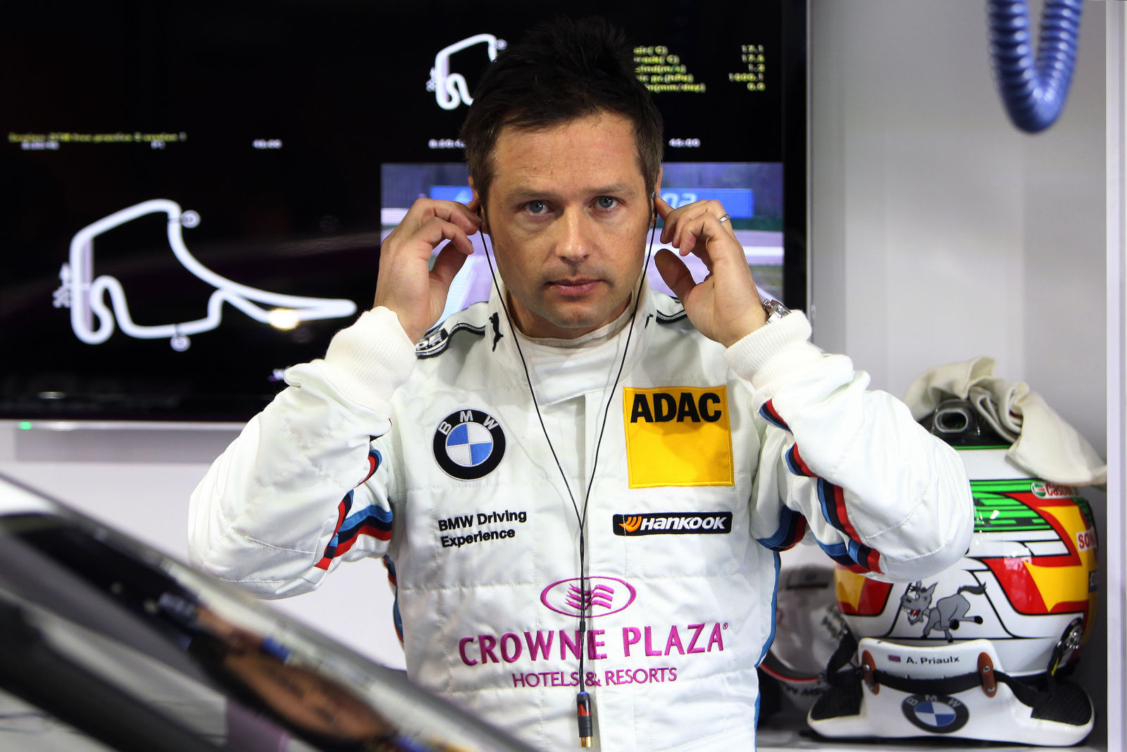 Touring Car: Andy Priaulx (and GOAT touring car maker is BMW)