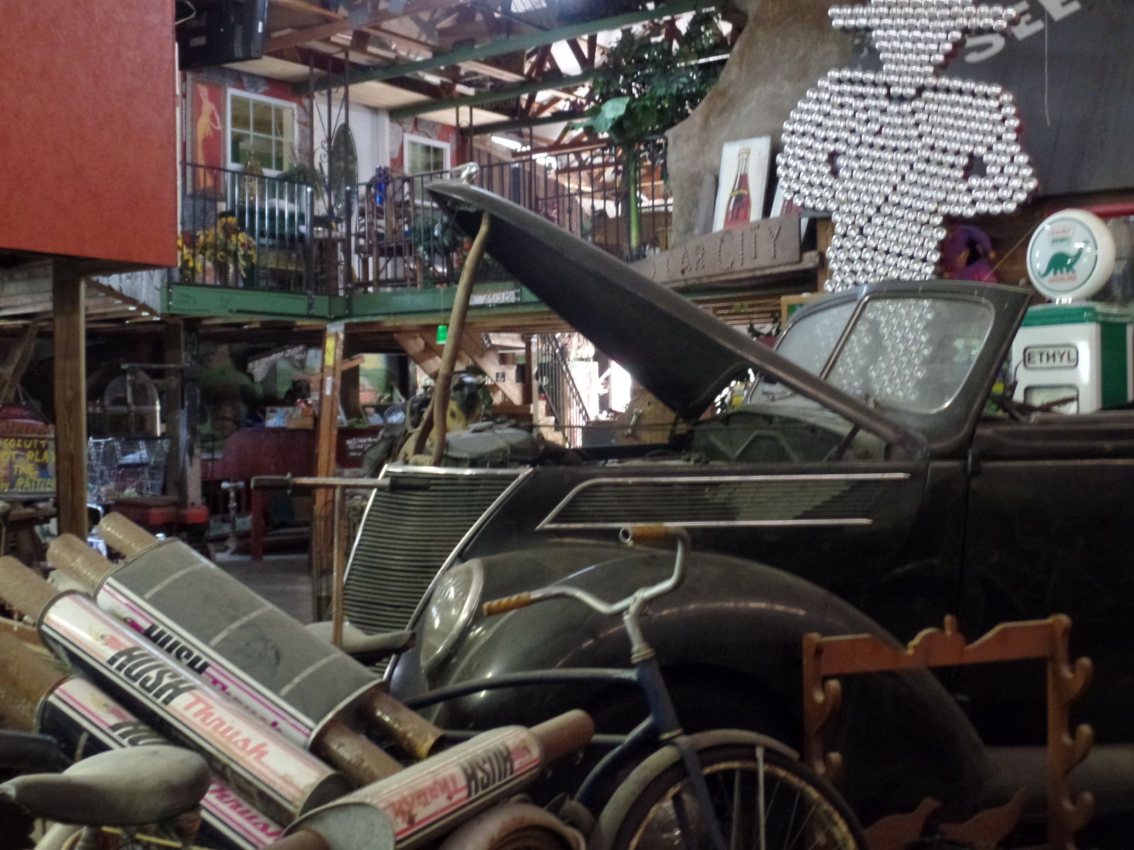 The inside of the lobby building. Home to several restored cars, folk art, and classic Americana.