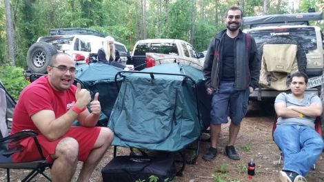 Alex and Pablo, Bronte and Omar sitting around camp being cheezy.