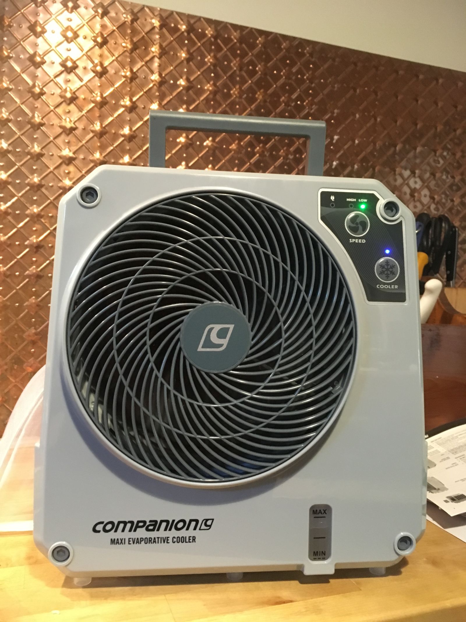 Runs from mains power, 12v, or it’s own battery for about 3 hours. Works as a fan or an evaporative air conditioner. Yes I am getting soft.