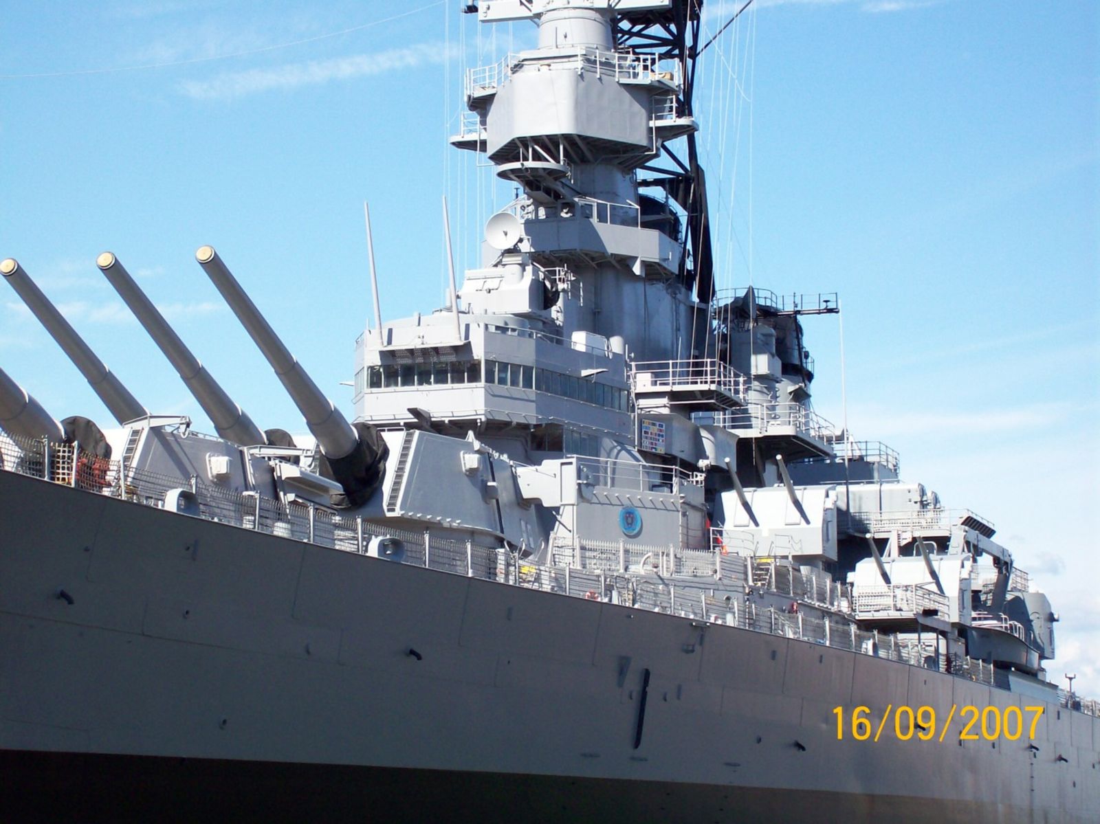 Wisky’s port side, showing off one of her four 16&quot; gun turrets as well as several 5&quot; turrets and her bridge