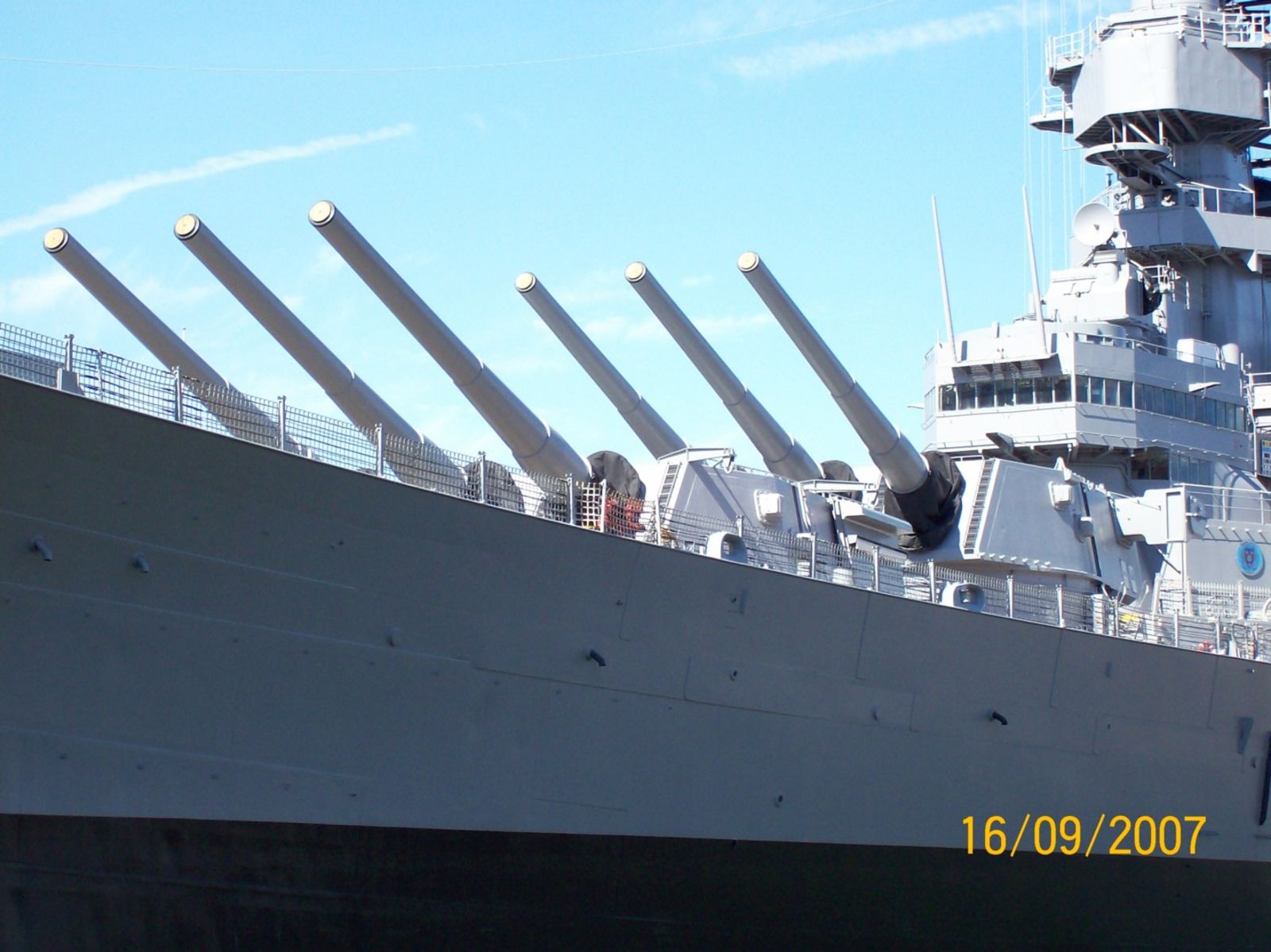 Both forward turrets. Throughout her service, the Wisconsin fired 319 16&quot; rounds, each weighing 1900 to 2700 pounds