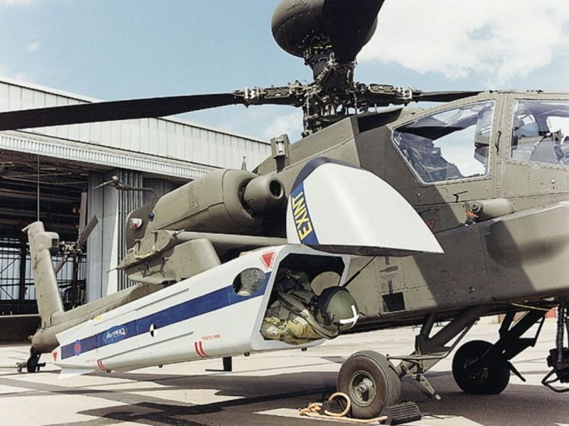 An AVPRO EXINT pod on an Apache’s weapons sponson