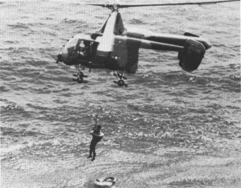 A U.S. Air Force Kaman HH-43B/F Huskie rescues a pilot from the South China Sea, circa 1969.